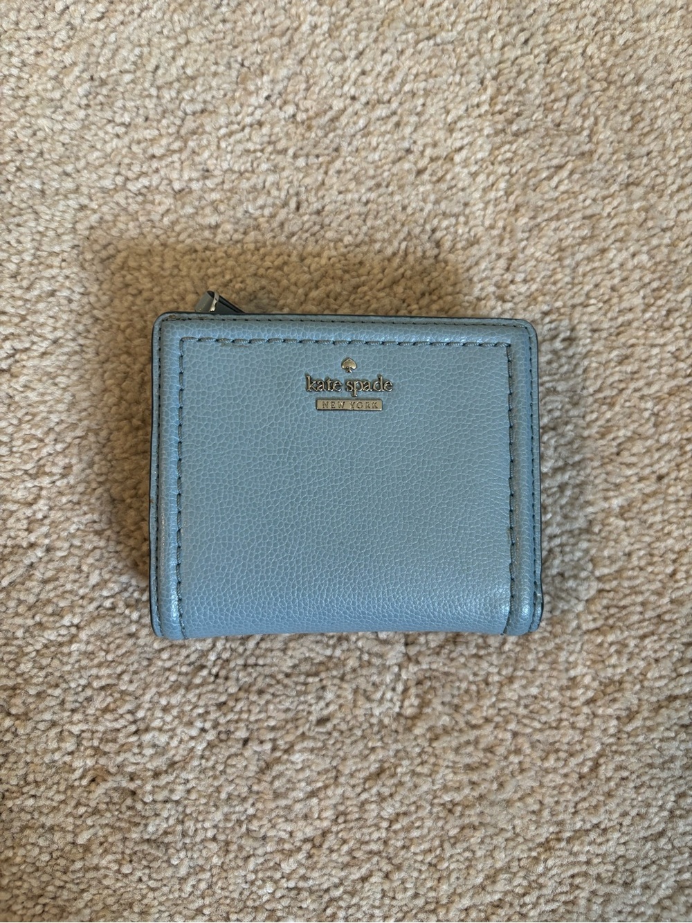 kate spade pale blue leather zip-around wallet